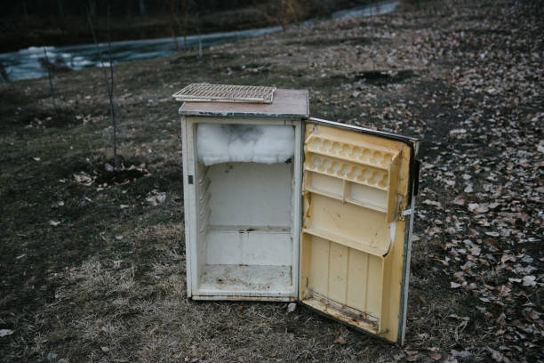 istock An old open refrigerator stands outside on the street 1128035443