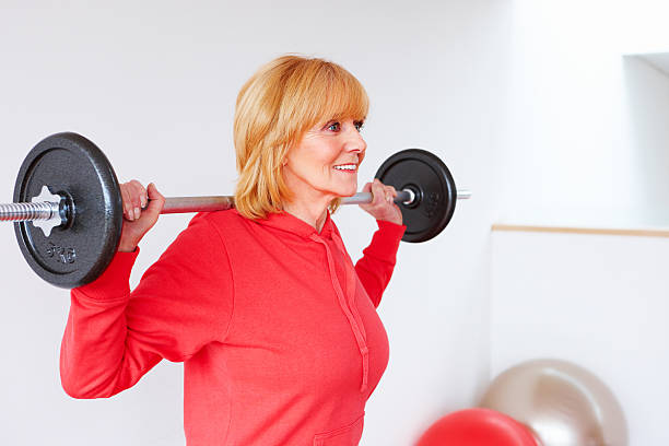 istock Senior Woman Performing Squats 112803856