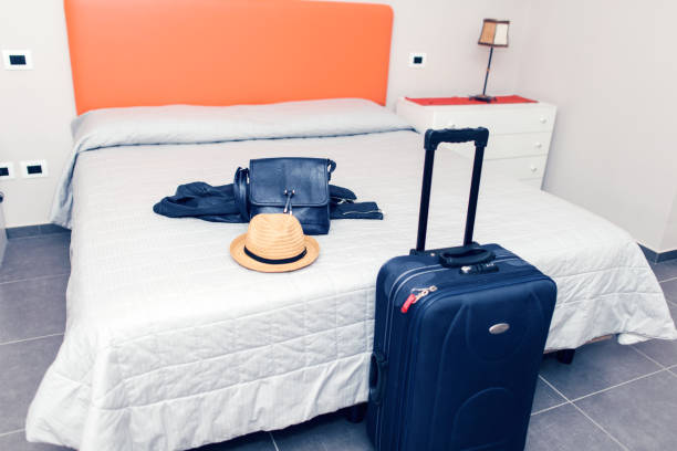 istock Luggage in a hotel room 1128040037