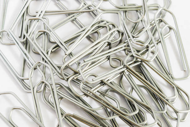 A group of metal staples A group of metal staples documento stock pictures, royalty-free photos & images