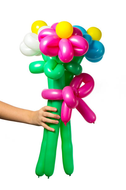 When the hand holds flowers from balloons