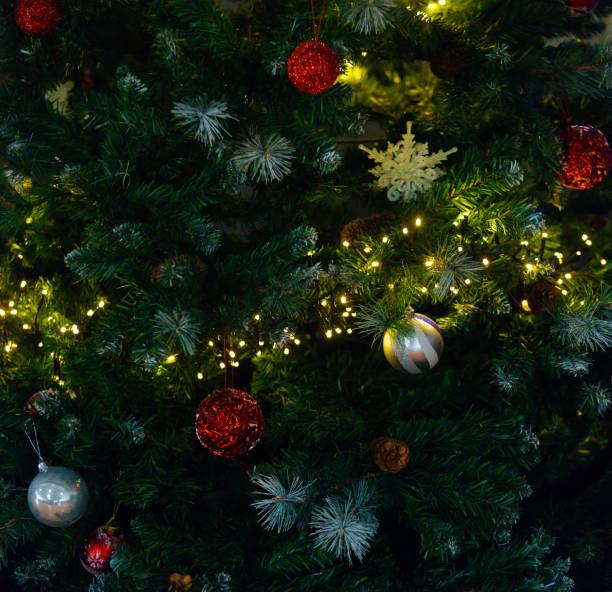 istock Full Frame Shot Of Illuminated Christmas Tree At Night 1128046559