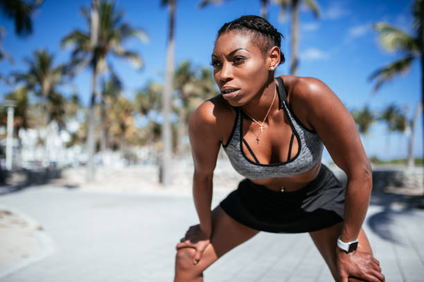 istock Afro-Latino woman resting after the training 1128046566