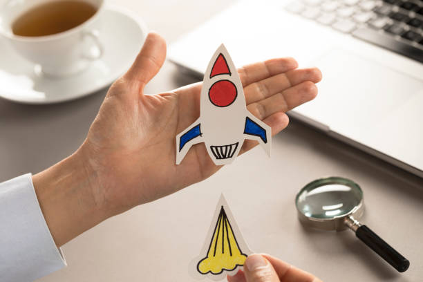 istock Business Person with Startup Rocket 1128049351
