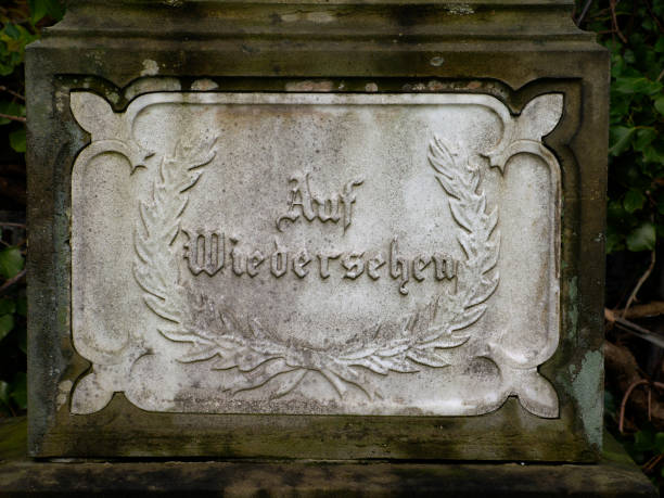 sign on a grave saying 