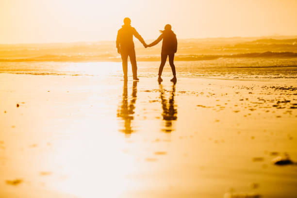 istock Loving Mature Couple Silhoutte At Oregon Coast 1128049977