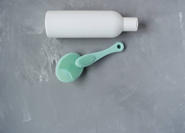 istock White bottle without inscriptions on a gray background 1128051416