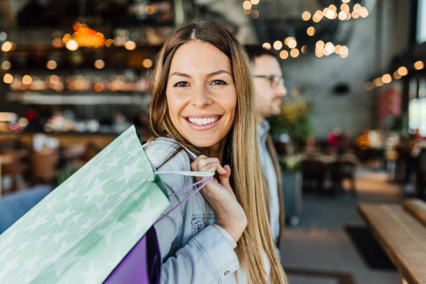 istock Young couple in shopping 1128056061