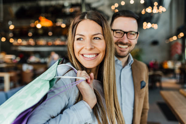 istock Young couple in shopping 1128056063