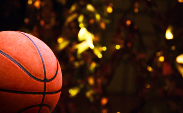 istock basketball ball gold bokeh 1128056441