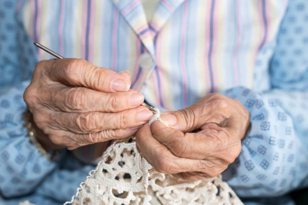 istock Hands of elderly person 1128057633