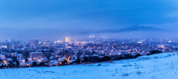 istock Snowy landscape with Nitra city, Slovakia, evening time 1128057676