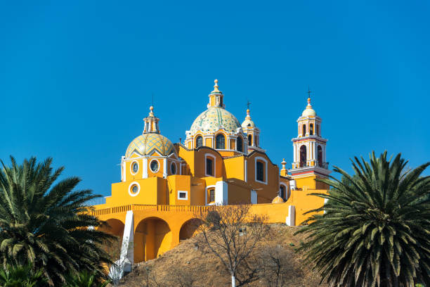 Yellow Church and Palm Trees