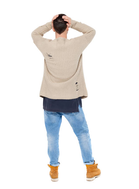 istock Back view of shocked  man. 1128060832