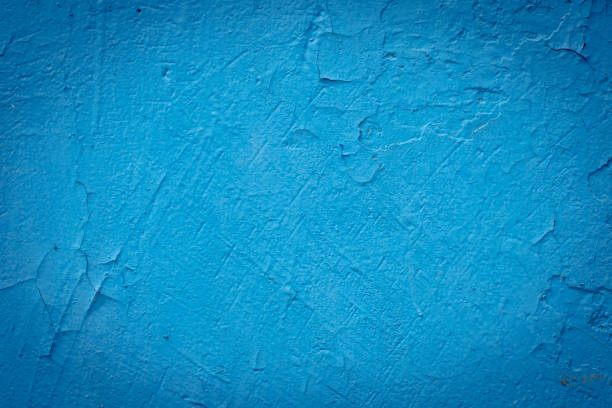 istock Cement painted wall background, baby-blue pastel color texture 1128062940