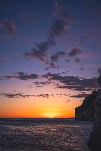 istock Beautiful sunset over the cliffs in Petrovac 1128066154