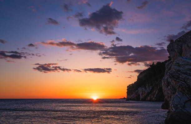 istock Beautiful sunset over the cliffs in Petrovac 1128066259