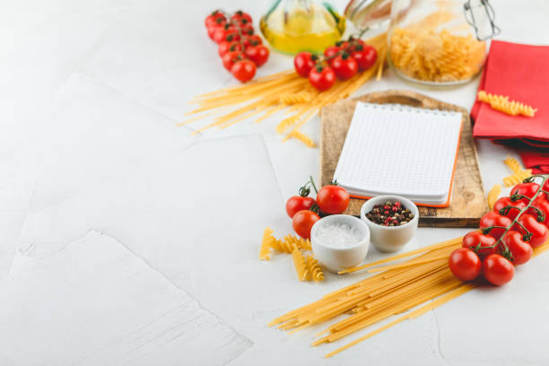 istock Italian Pasta with tomatoes, oil 1128067879