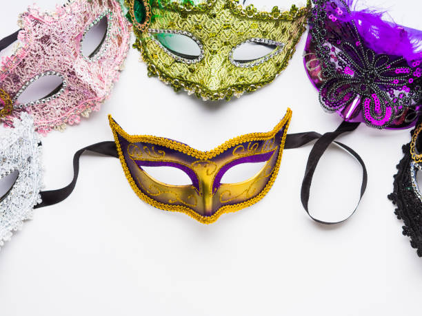 istock Colorful carnival masks on white background 1128070860