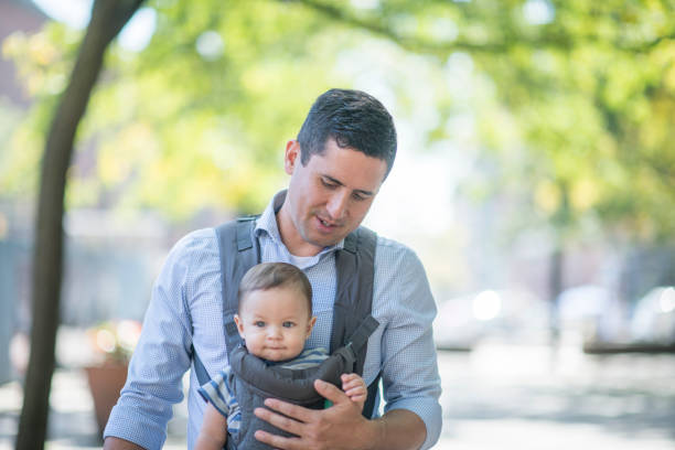 istock A dad walks down the street with baby 1128072105