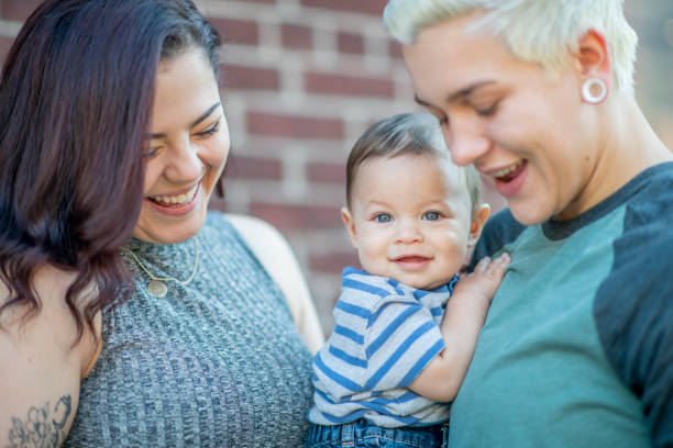 istock LGBT family smiling 1128072123