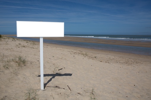 blank empty frame on sand beach for message advertising