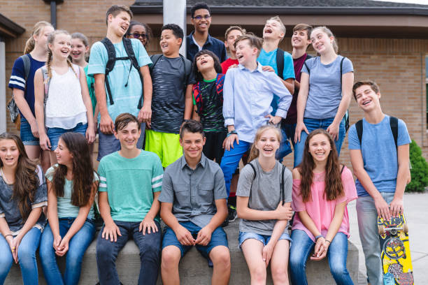 istock Portrait of elementary-age students outside the school 1128073421