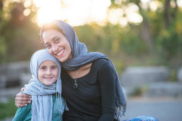 istock Hugging Mother And Daughter 1128074137