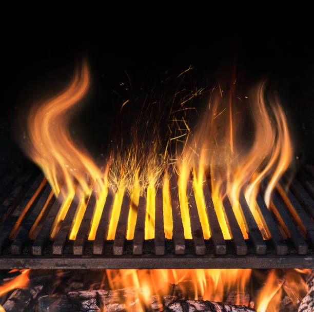 istock Empty grill grate and tongues of fire flame. 1128074493