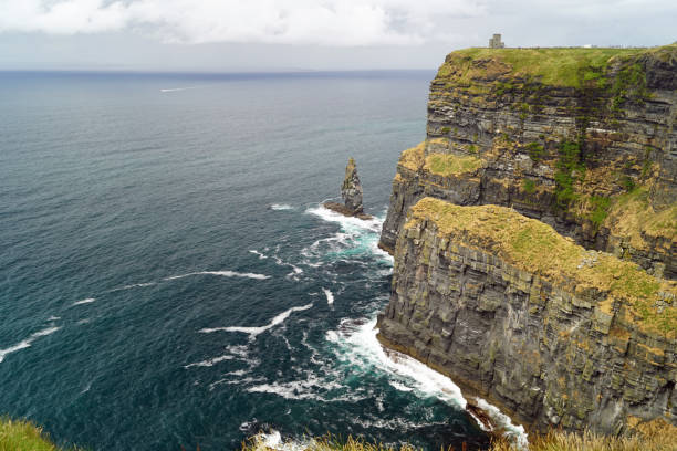 istock Wild Atlantic Way Cliffs of Moher  View to O Briens Tower 1128076519