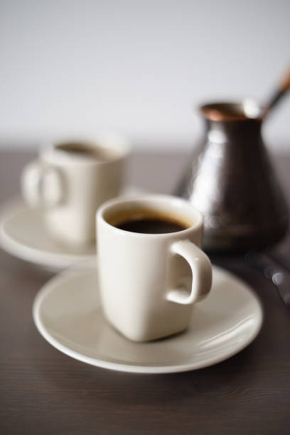 istock Black Turk coffee brewed in Turkish coffee pot minimalist style 1128077066