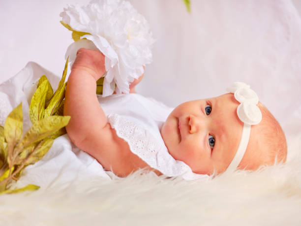 istock Six Month Old Baby Girl 1128077121