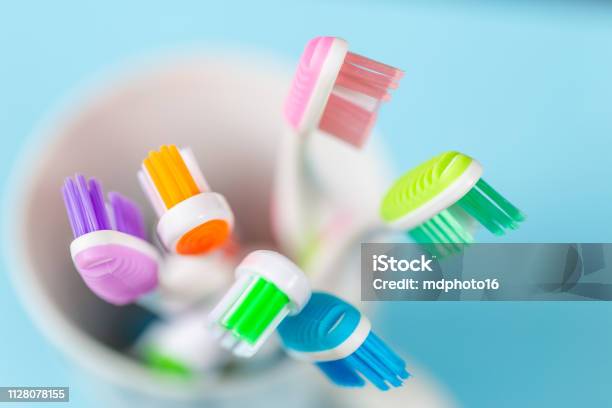 Toothbrushes Stock Photo - Download Image Now - Toothbrush, Cup, Bathroom