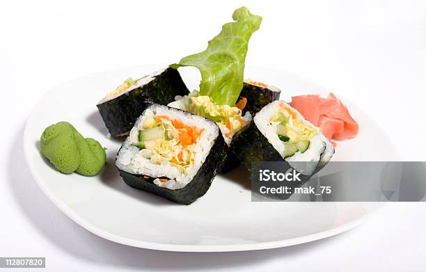 Y Sushi Enrollados Foto de stock y más banco de imágenes de Aguacate - Aguacate, Alimento, Aperitivo - Plato de comida