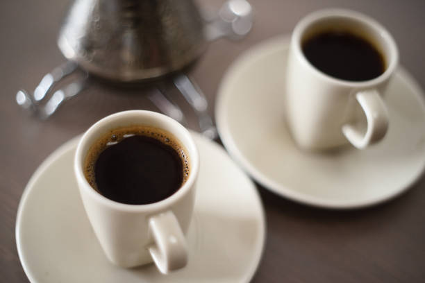 istock Black Turk coffee in ivory coffee cups minimalist style 1128078230