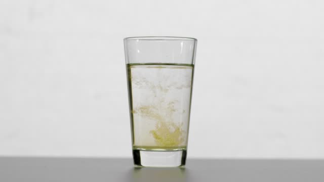 Glass of Polluted Water