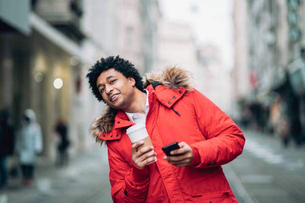 istock Modern man walking on the street 1128083731