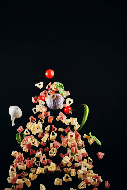 istock Heart Shaped Macaroni Pasta Food Explosion 1128085291