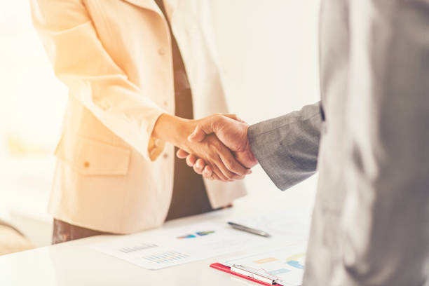 istock Close-Up Of Business People Shaking Hands 1128092305