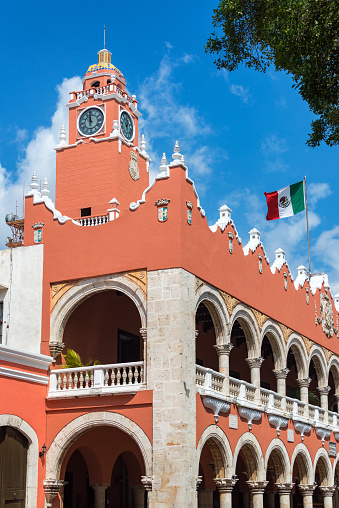 City hall in Merida, Mexico with the Mexican flag flying above it