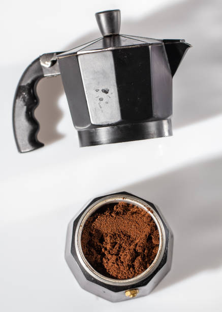 istock black geyser coffee maker with ground natural coffee inside on a white background 1128095713