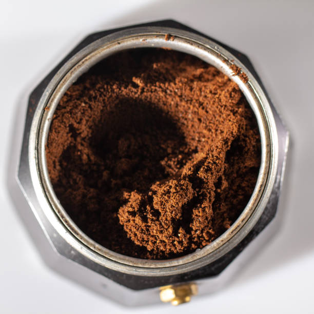 istock black geyser coffee maker with ground natural coffee inside on a white background 1128095714