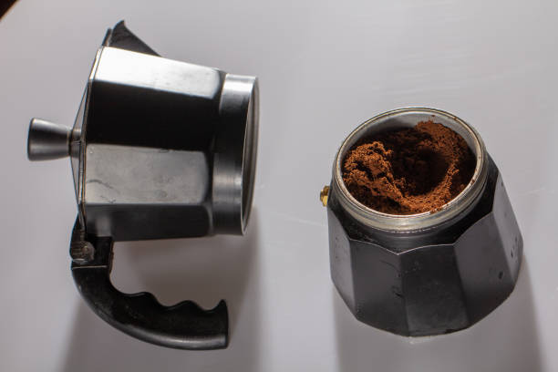 istock black geyser coffee maker with ground natural coffee inside on a white background 1128095715