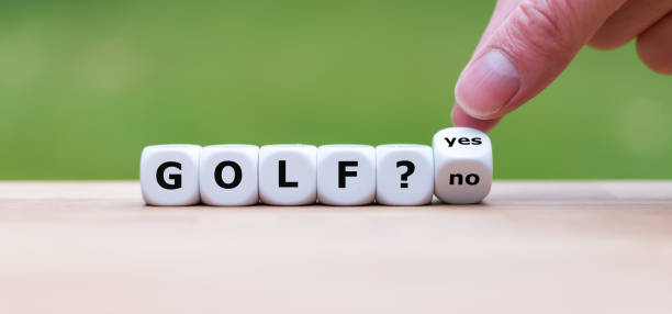 istock Play golf? Hand turns a dice and changes the word 