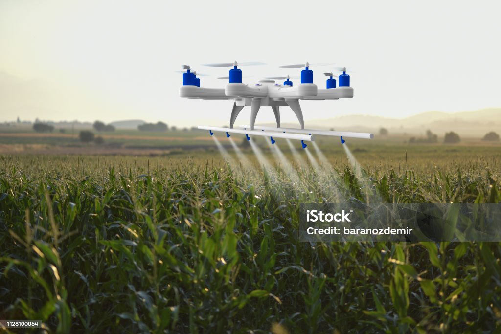 Drone spraying a field Drone Stock Photo