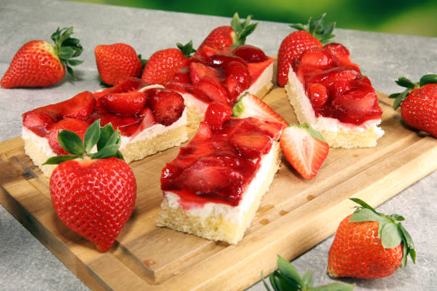 istock strawberry cake and many fresh strawberries on grey background table 1128101371
