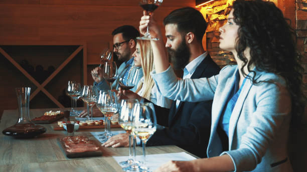 istock Friends tasting wine together 1128102615