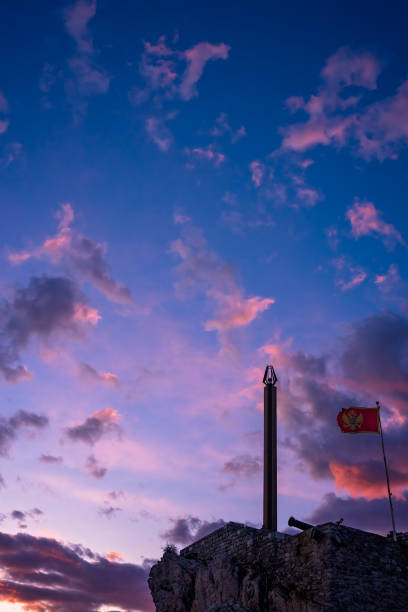 istock Obelisk and flag on the cliffs at dusk 1128102633