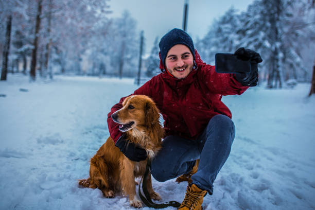 istock Friendship between pet owner and his dog 1128105817
