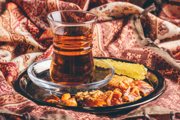 istock Tea in armudu with oriental delights and crystal sugar 1128105846